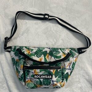 ROCAWEAR tropic botanical print 3-pocket belt bag.